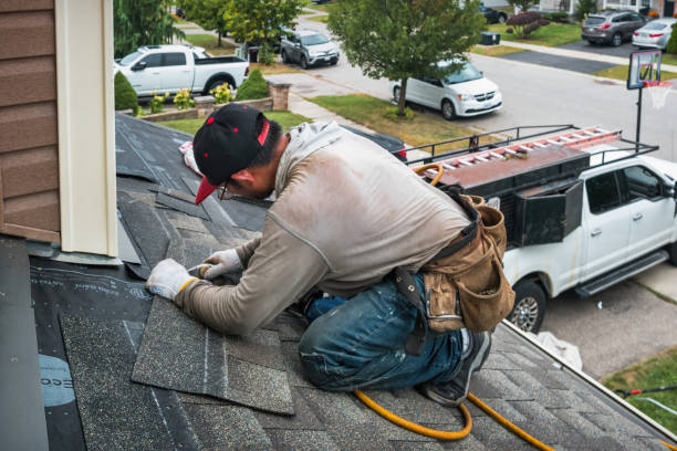 Professional Roofing technician working in Hayes, VA